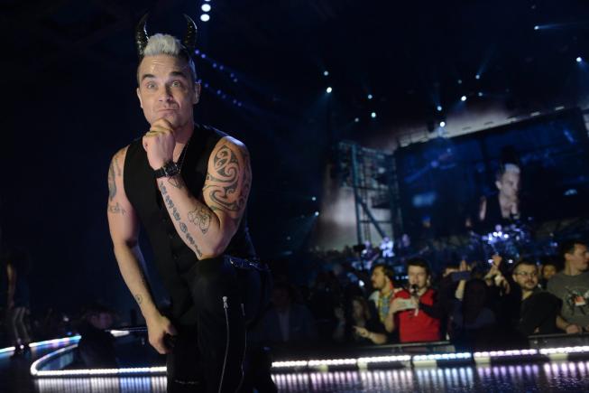 Robbie Williams își face o nouă trupă, la 25 de ani de la plecarea din Take That
