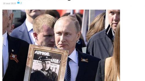 Putin a purtat portretul tatălui său la defilarea de la Moscova