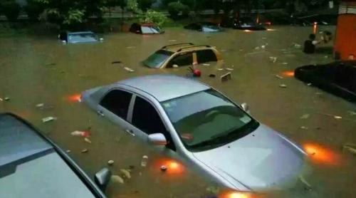 Ploile torențiale au făcut PRĂPĂD în China! 50.000 de persoane au fost evacuate, 13 au murit (VIDEO)