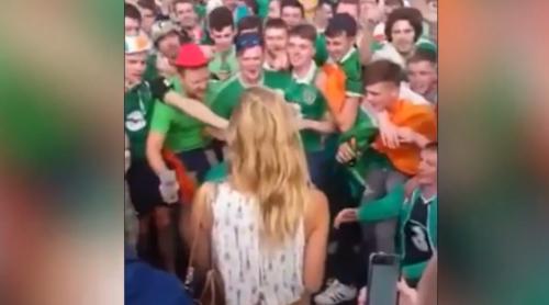 SCENĂ INCREDIBILĂ la Euro 2016! Ce se întâmplă când sute de fani irlandezi întâlnesc pe stradă o franţuzoiacă sexy (VIDEO)