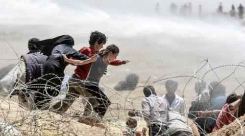 11 sirieni civili, între care patru copii, ÎMPUŞCAŢI de grănicerii turci la frontieră (VIDEO)