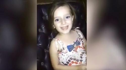 IMAGINI CUMPLITE. O fetiță din Siria, filmată cântând fericită înainte ca o bombă să explodeze lângă casa ei (VIDEO)