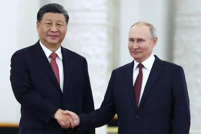 Vladimir Putin spune că a avut discuții „foarte importante și sincere” cu Xi Jinping