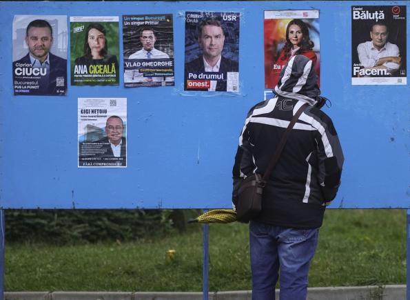 REUTERS - București votează în cursa pentru primărie care ar putea aduce extrema dreaptă la conducerea primei capitale a UE