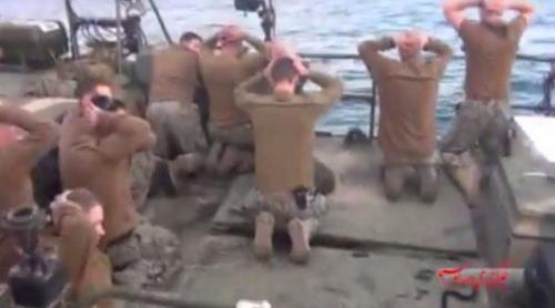 Umiliți și Fără Reacție! Momentul Capturării Militarilor Americani Aflați pe Navele de Război Reținute de Iran (VIDEO)