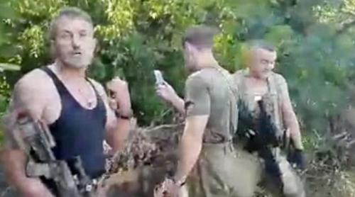 Soldaţi ucraineni, filmaţi în timp ce caută pokemoni prin boscheți, într-o zonă de război (VIDEO)