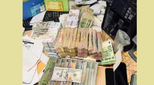 Ucraina: Mașină plină cu bani, interceptată în centrul Kievului. Poliția a destructurat o vastă rețea de evaziune fiscală și spălare de bani din agricultura